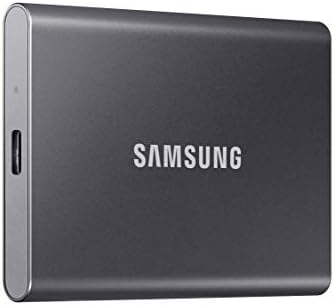 SAMSUNG T7 Portable SSD 1TB gray drive connected via USB-C to a laptop, highlighting its use.