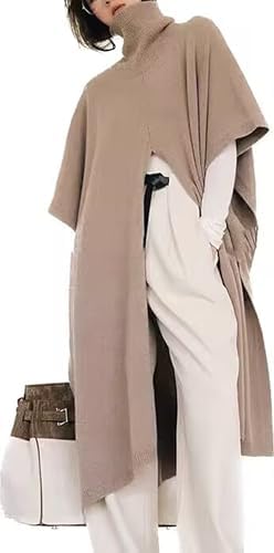 Woman models a high-neck cashmere wool poncho in a solid color, looking elegant.