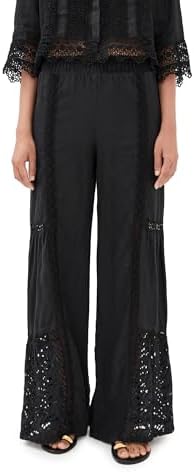 Woman relaxing at a resort, wearing stylish Temptation Positano Cervaro pants.