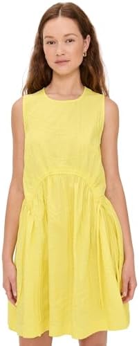 Woman models the Sea Camden cotton poplin tank mini tunic in a casual setting.