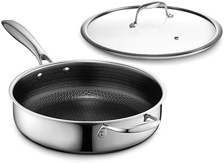 HexClad Hybrid Nonstick 3.3-Quart Deep Sauté Pan with tempered glass lid, angled view.